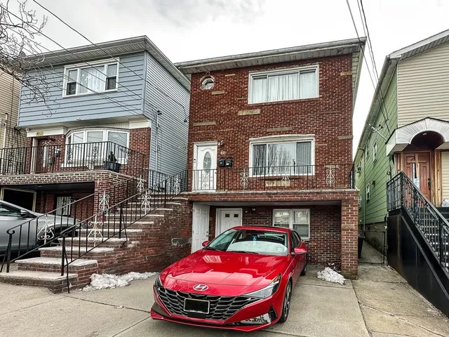 a view of a cafe with sitting area