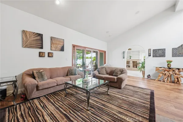 a spacious bedroom with a bed and a table
