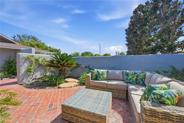 a view of a backyard with a garden