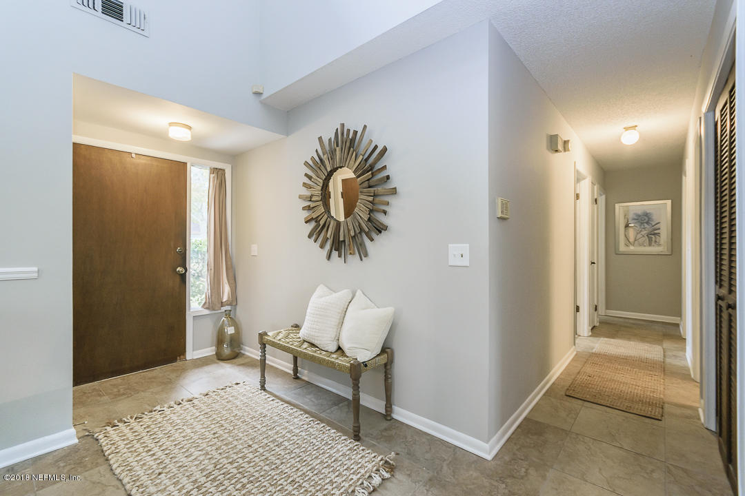 2526 Wattle Tree Road West Jacksonville, FL 32246 - Photo 4 of 19 a bathroom with a sink and a mirror