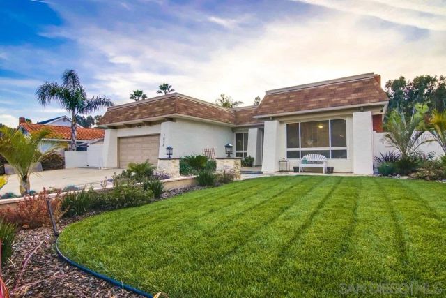 a house view with a garden space