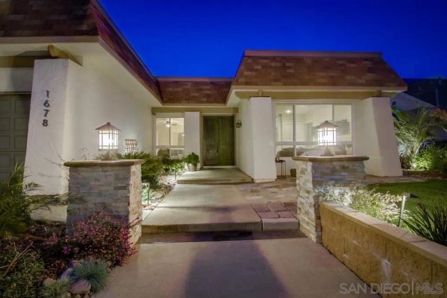 a view of a house with a patio