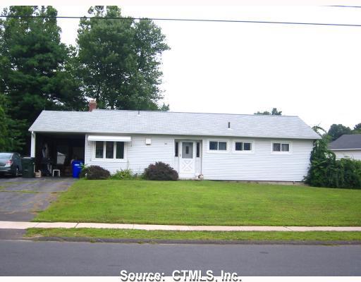 30 Greenwood Road Windsor Locks, CT 06096 - Photo 1 of 1 a front view of a house with a yard and garage