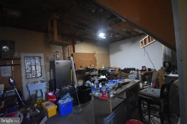 a view of a workspace with furniture