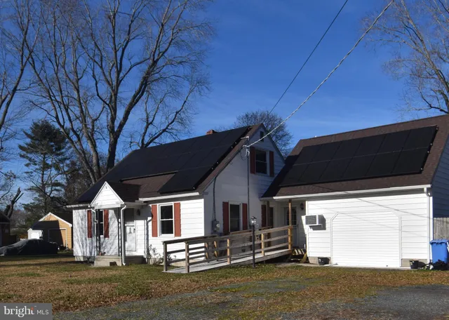 a front view of house with yard