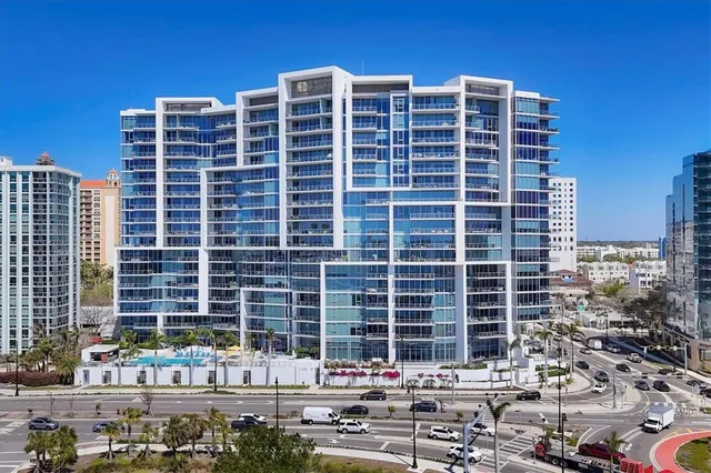 a front view of a building with glass windows