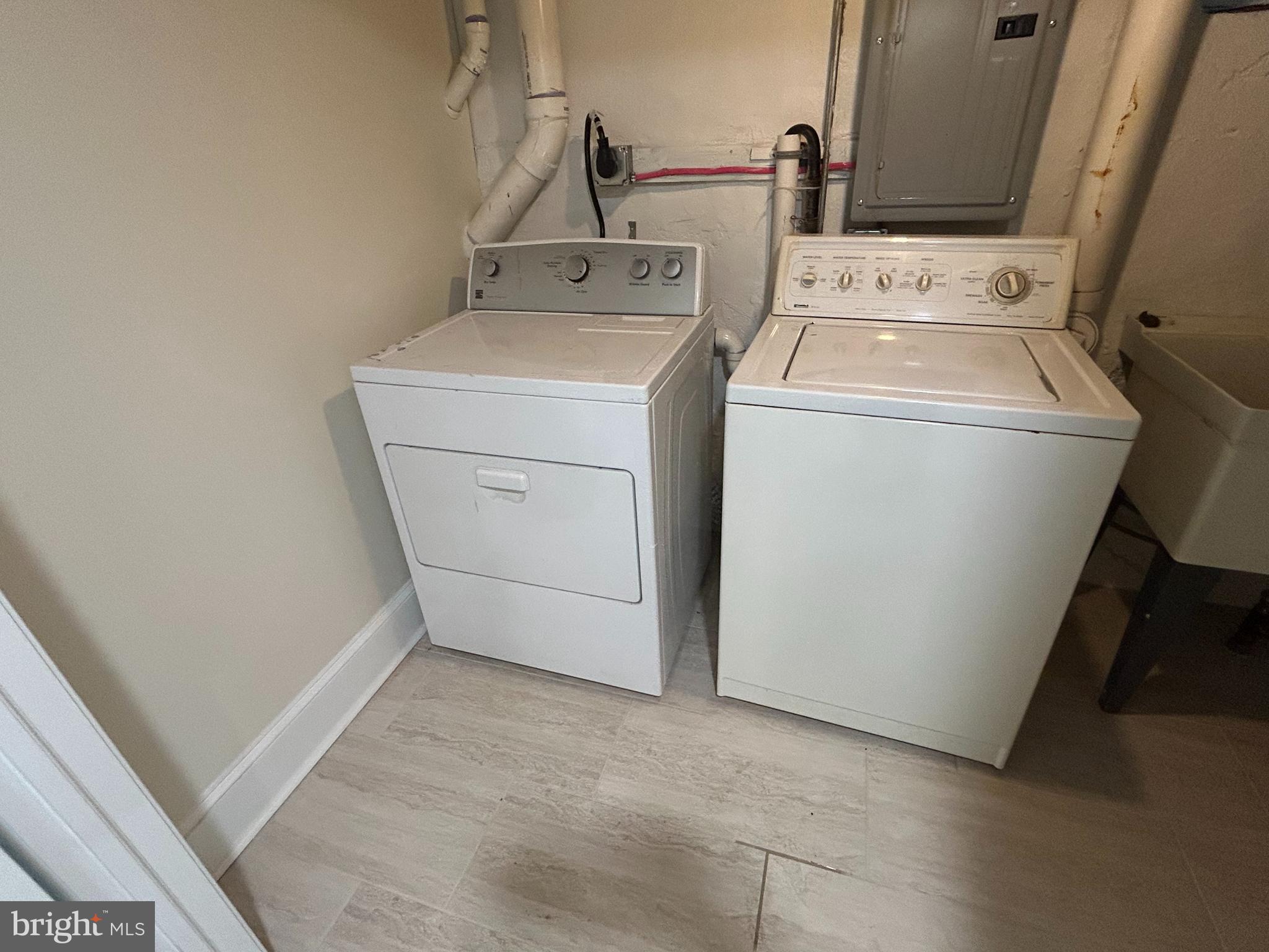 12 Rodney Road Bryn Mawr, PA 19010 - Photo 23 of 26 a utility room with dryer and washer