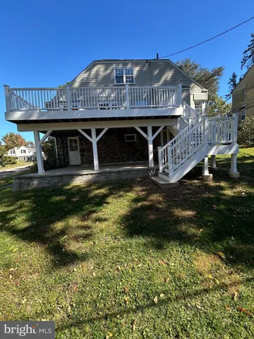 a view of a house with a big yard