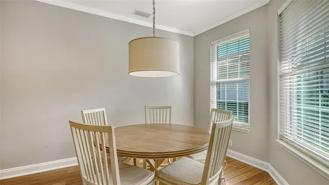 a kitchen with stainless steel appliances a sink stove and refrigerator