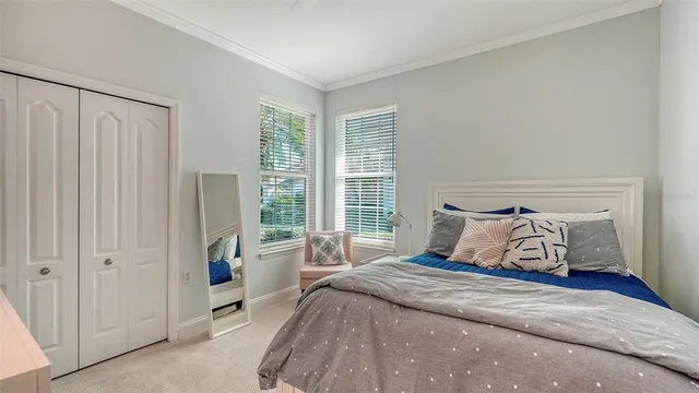 a view of a chair and tables in the patio