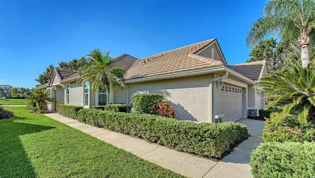 a plant that is in front of a house