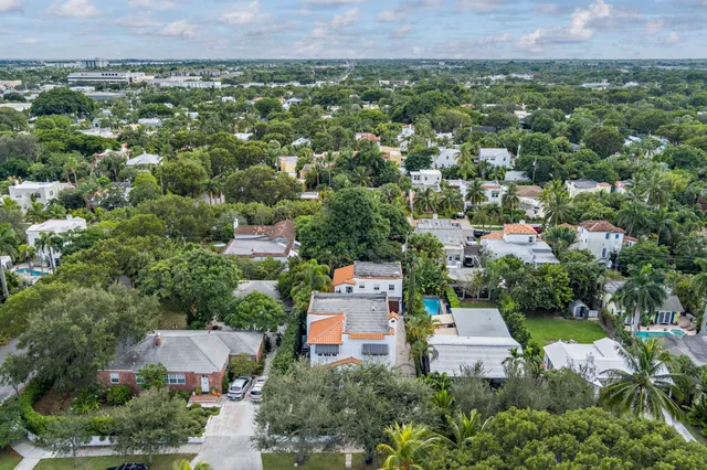 an aerial view of a house with a garden