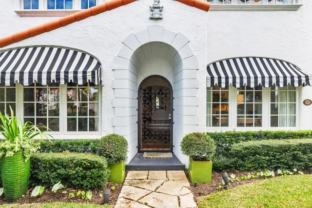 a front view of a house with windows