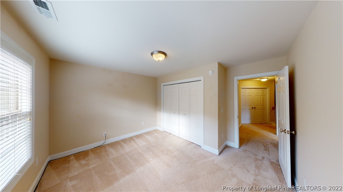 29 Hawk Ridge Drive Spring Lake, NC 28390 - Photo 29 of 33 a view of an empty room and a window