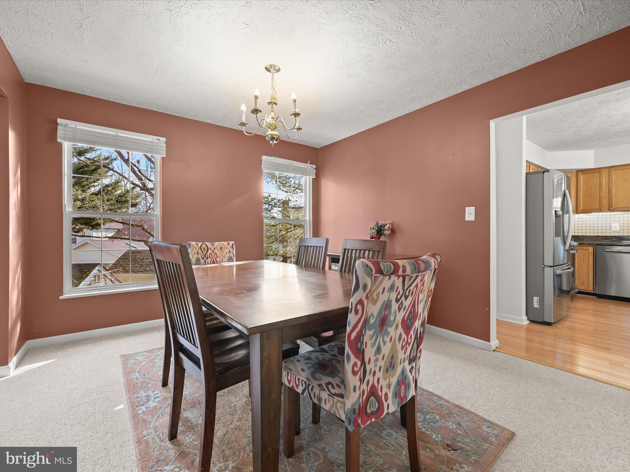 2333 Golden Chapel Road Odenton, MD 21113 - Photo 12 of 62 a view of a dining room with furniture window and wooden floor