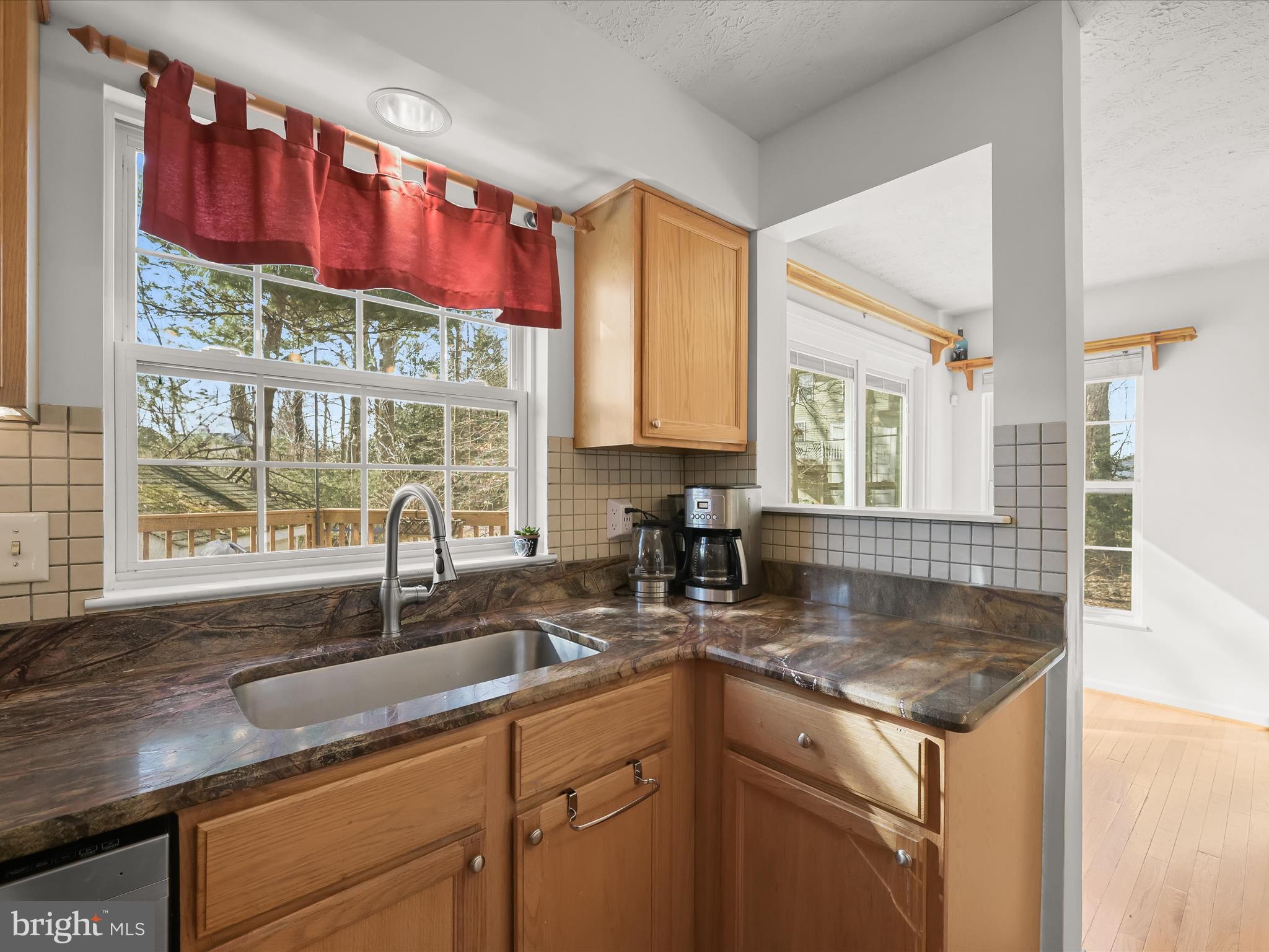 2333 Golden Chapel Road Odenton, MD 21113 - Photo 15 of 62 a kitchen with a sink stove and cabinets