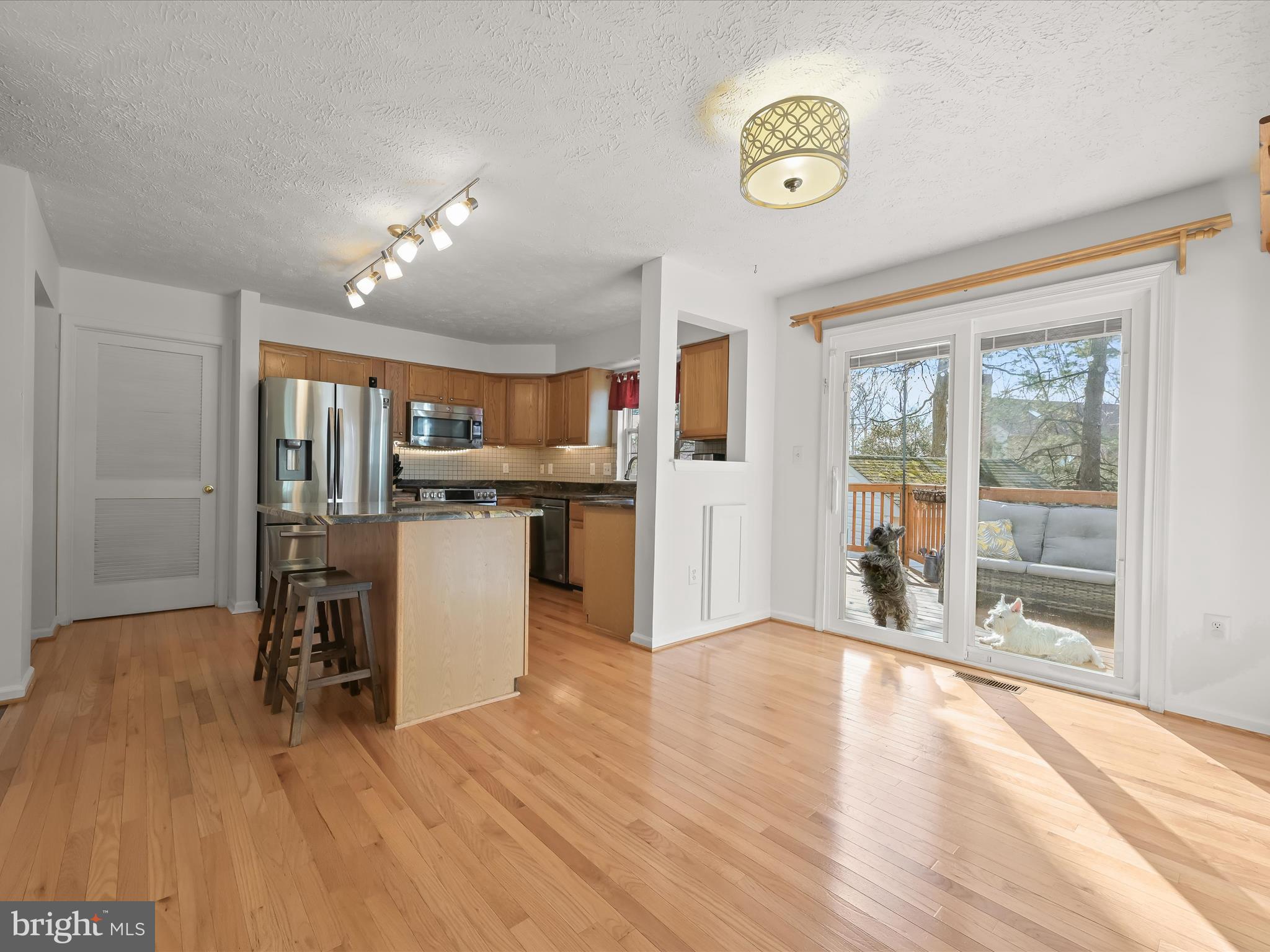 2333 Golden Chapel Road Odenton, MD 21113 - Photo 17 of 62 a view of a kitchen with furniture wooden floor and window