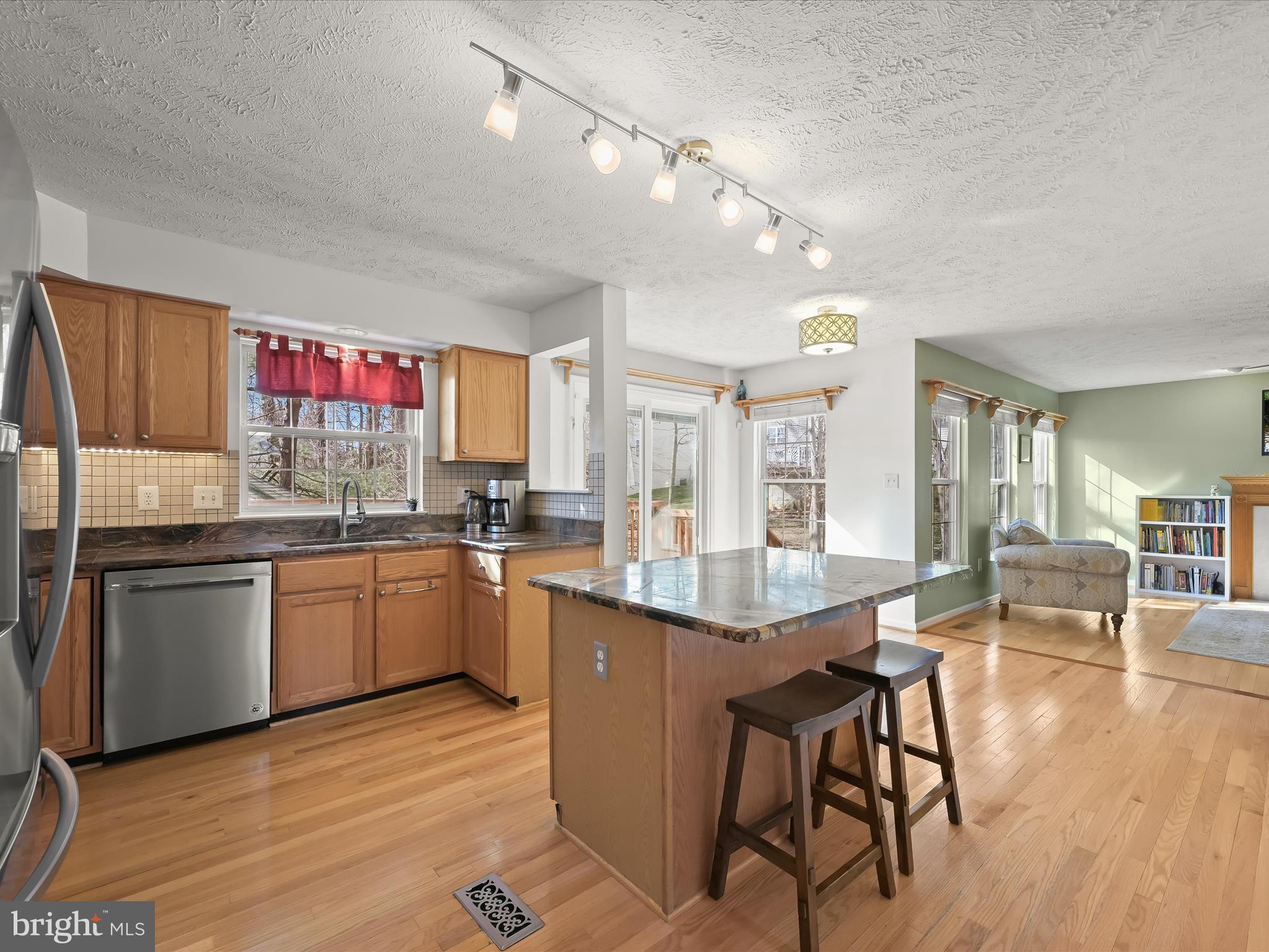 2333 Golden Chapel Road Odenton, MD 21113 - Photo 62 of 62 a kitchen with granite countertop lots of counter top space and dining table