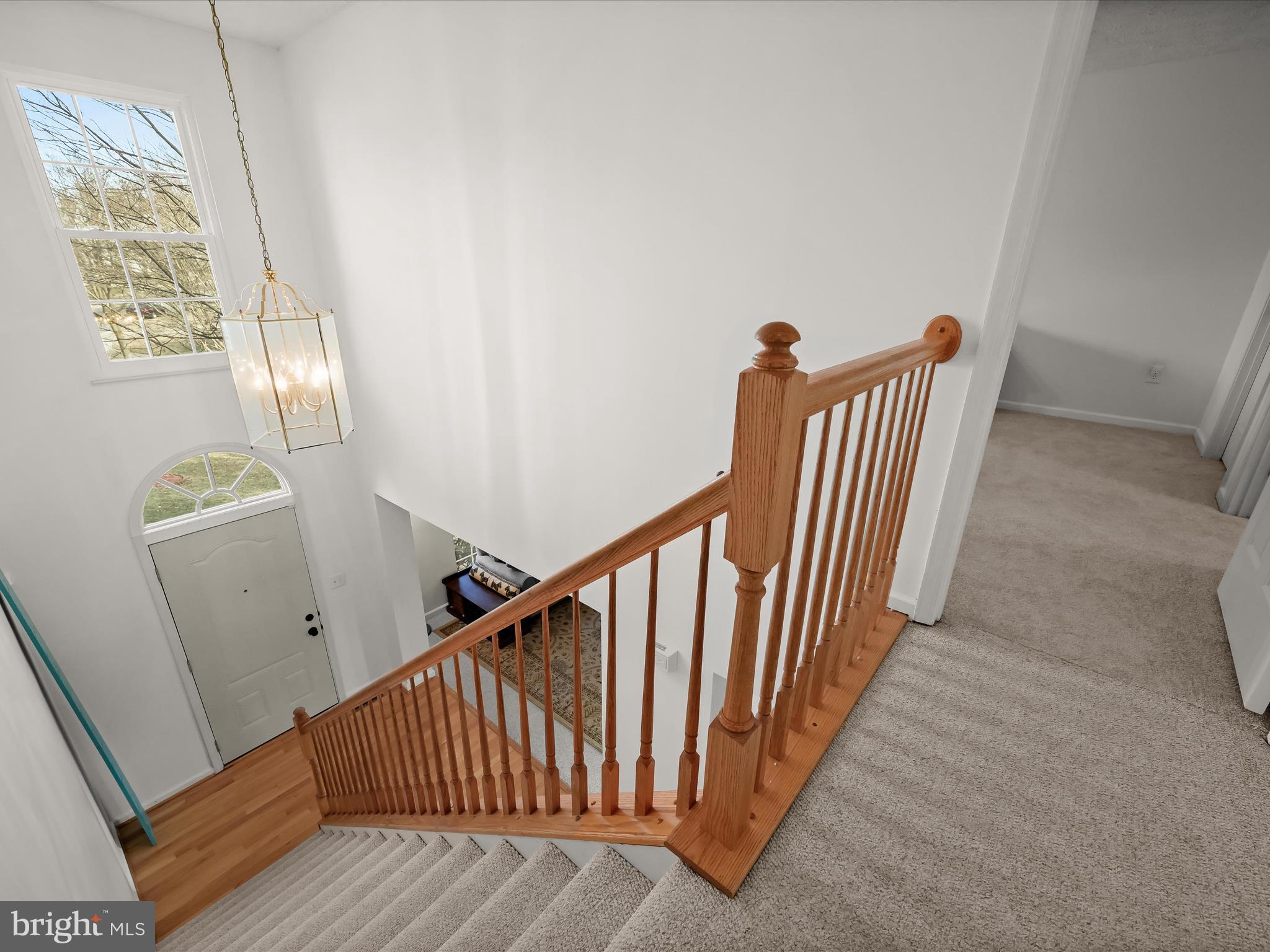 2333 Golden Chapel Road Odenton, MD 21113 - Photo 26 of 62 a view of entryway with stairs and wooden floor