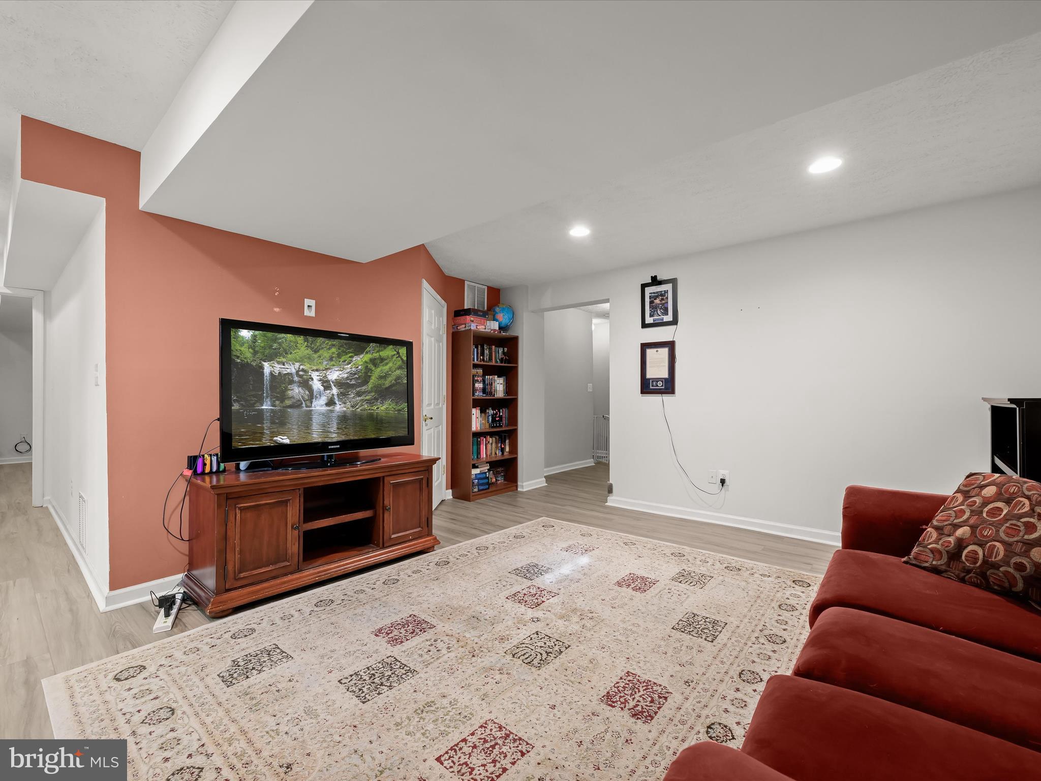 2333 Golden Chapel Road Odenton, MD 21113 - Photo 39 of 62 a living room with furniture and a flat screen tv