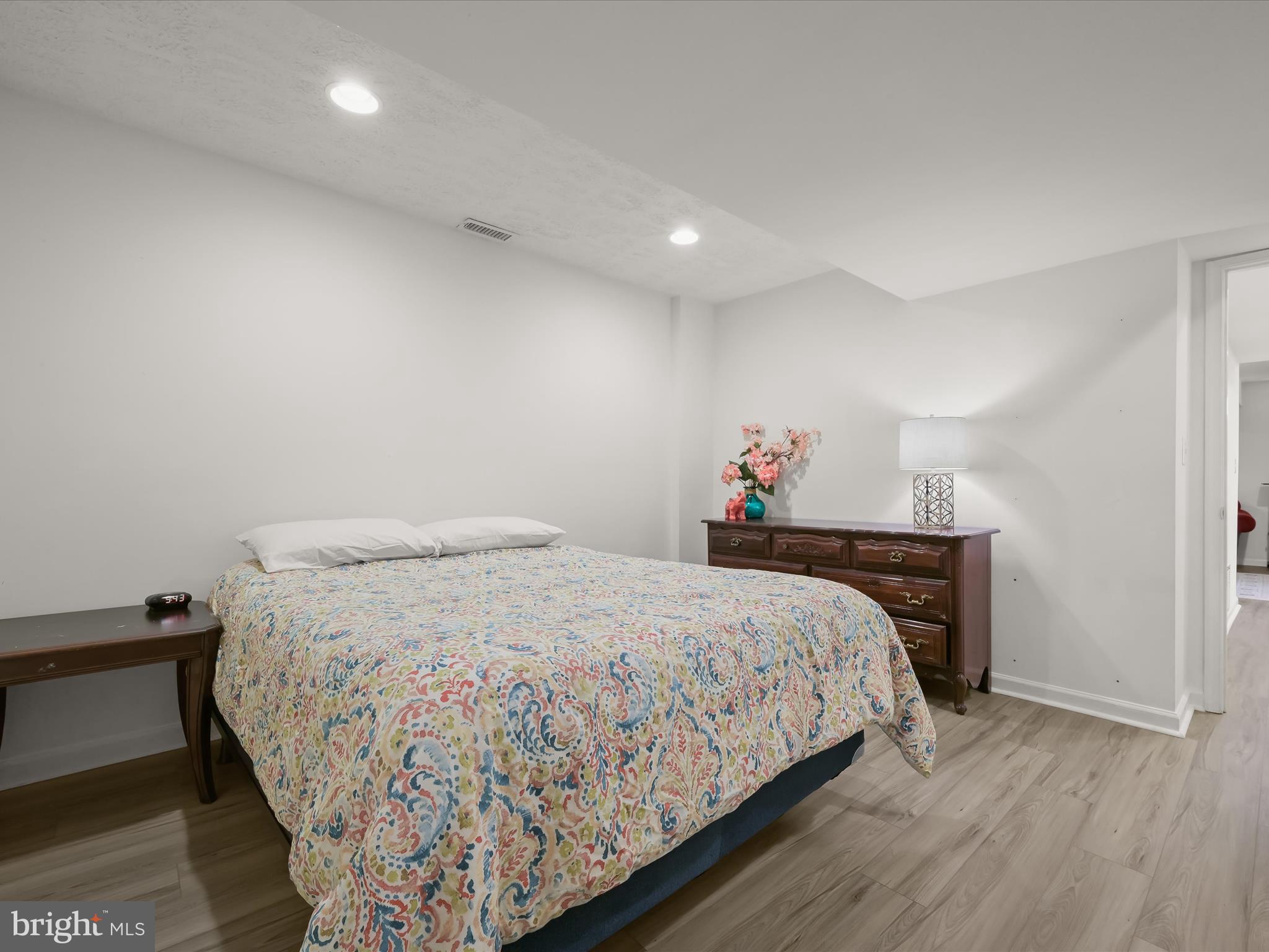 2333 Golden Chapel Road Odenton, MD 21113 - Photo 45 of 62 a bedroom with a bed and a dresser