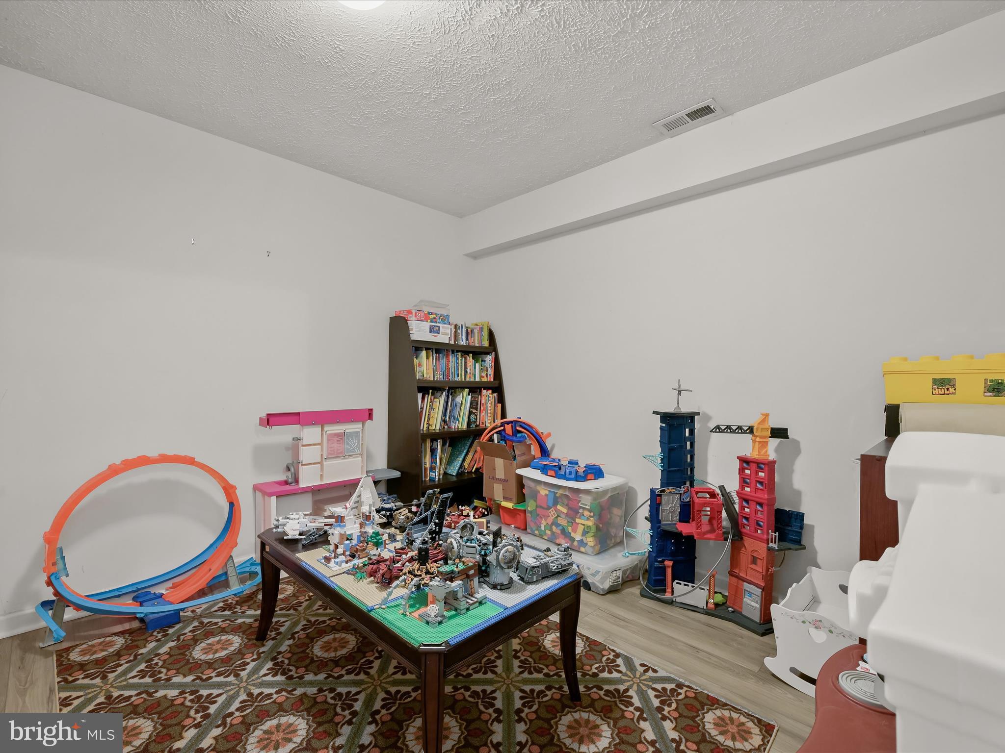 2333 Golden Chapel Road Odenton, MD 21113 - Photo 46 of 62 a living room with furniture and a wooden floor