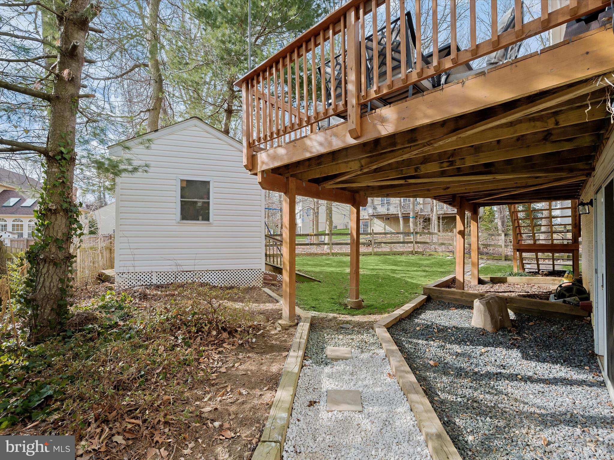 2333 Golden Chapel Road Odenton, MD 21113 - Photo 57 of 62 a view of a house with backyard sitting area and garden