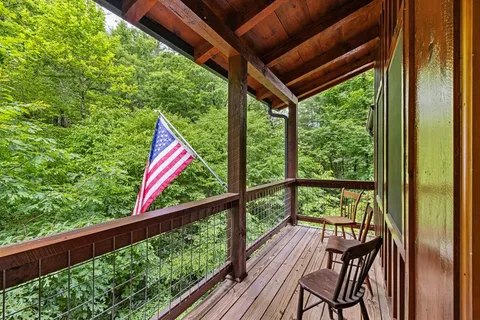 a view of balcony with furniture