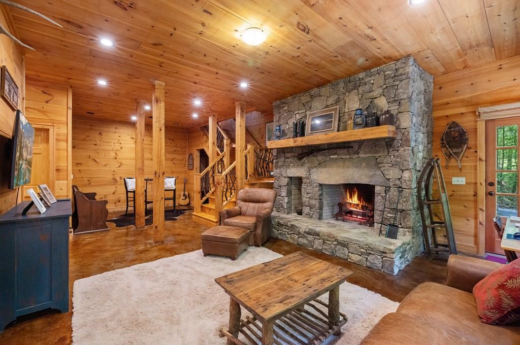 80 Tall Pines Road Morganton, GA 30560 - Photo 21 of 49 a living room with fireplace furniture and a fireplace