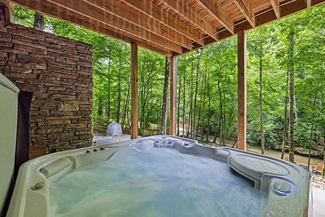 a bedroom with a bed and a fireplace