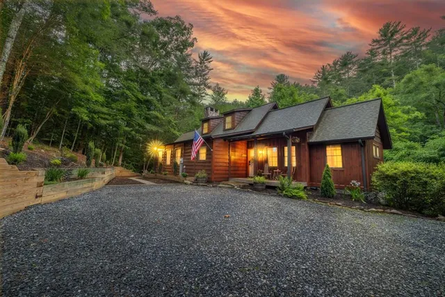 a view of a house with a street