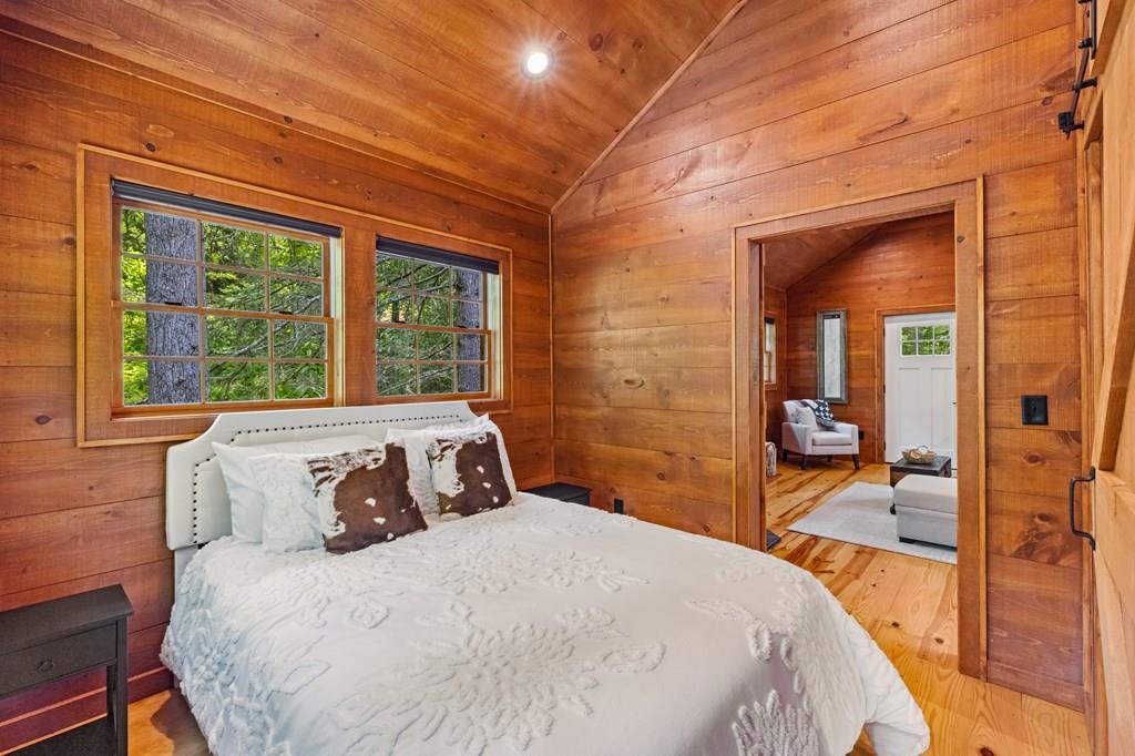 80 Tall Pines Road Morganton, GA 30560 - Photo 39 of 49 a bedroom with a bed and wooden floor