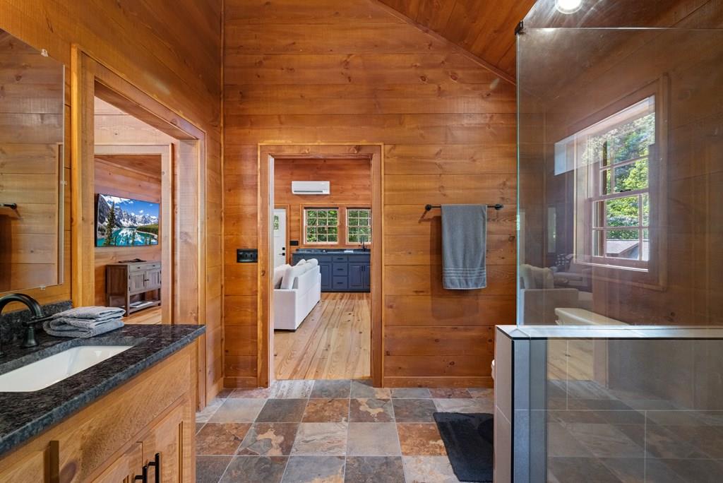 80 Tall Pines Road Morganton, GA 30560 - Photo 41 of 49 a bathroom with sink shower and mirror