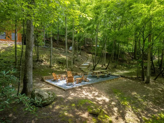 a backyard of a house with lots of green space