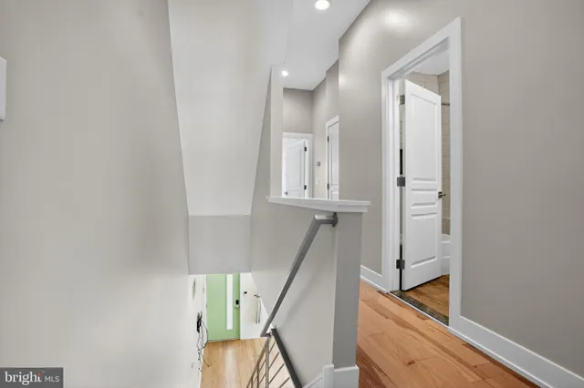 a view of entryway with wooden floor