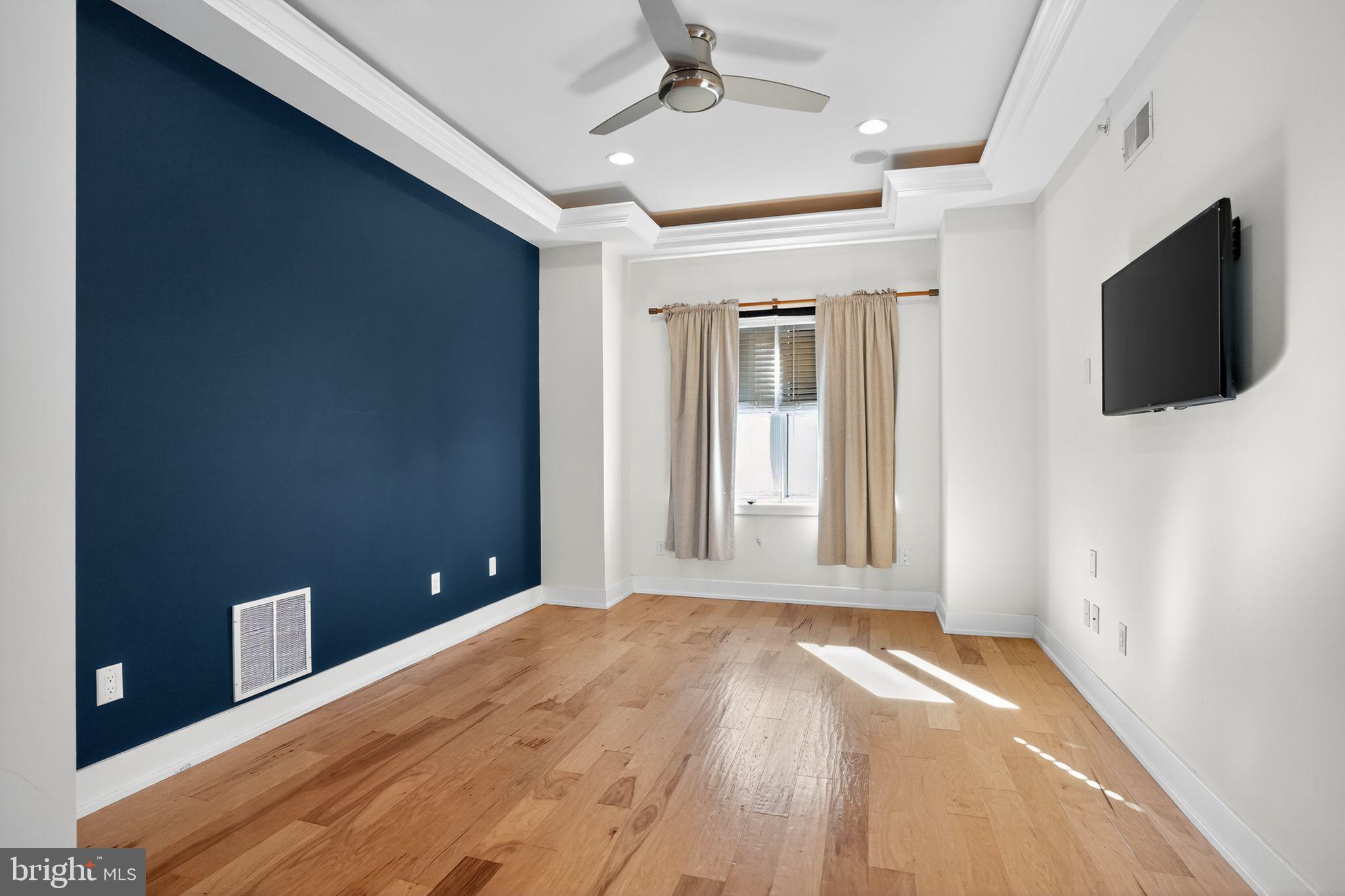 419 Emily Street Philadelphia, PA 19148 - Photo 20 of 34 a view of a livingroom with a flat screen tv