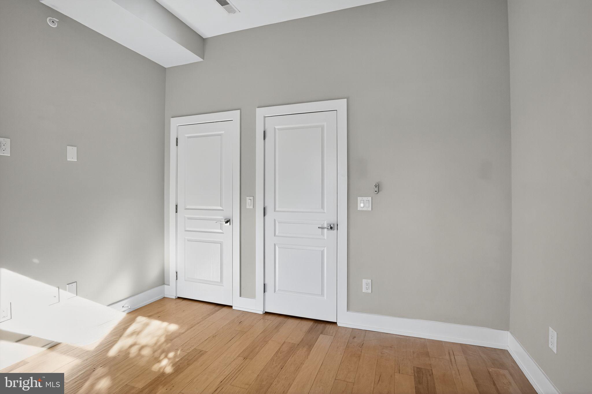 419 Emily Street Philadelphia, PA 19148 - Photo 23 of 34 a view of an empty room and wooden floor