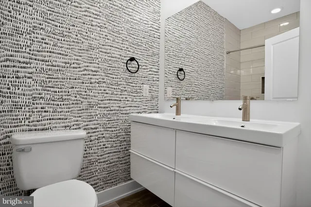 a bathroom with a shower and a bathtub