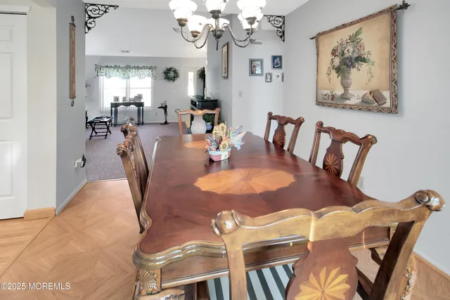 a view of a dining room with furniture