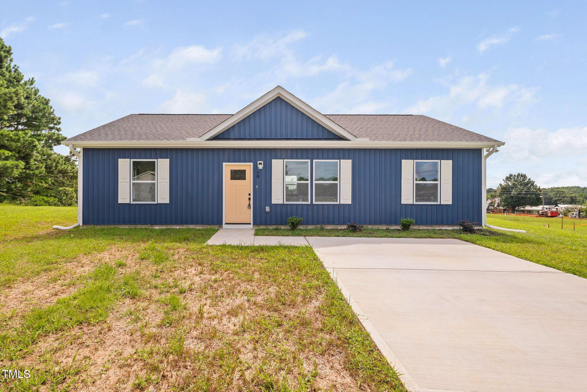 50 Southern Village Drive Roxboro, NC 27573 - Photo 1 of 32 a front view of a house with yard