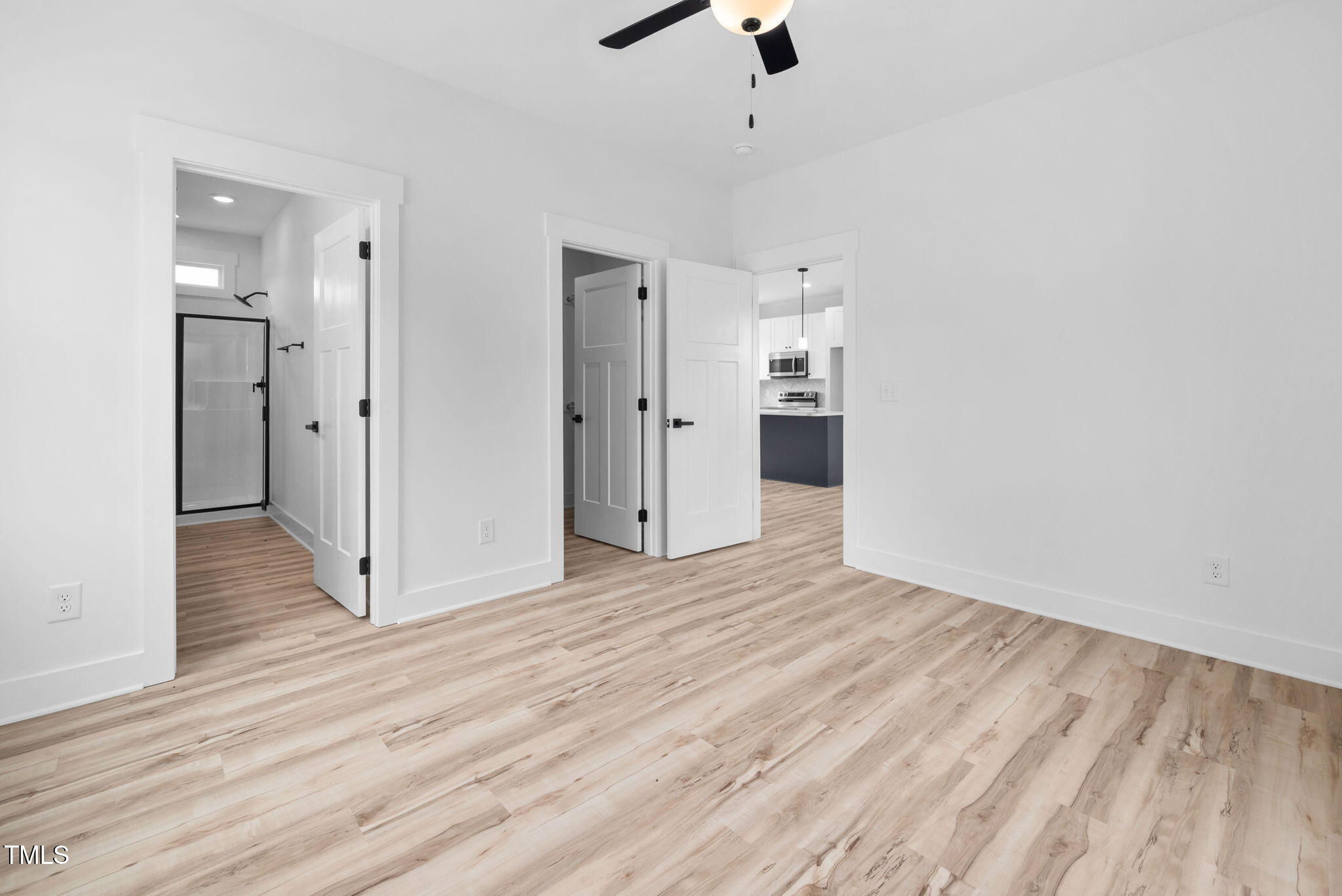 50 Southern Village Drive Roxboro, NC 27573 - Photo 20 of 32 a view of a room with wooden floor and white walls