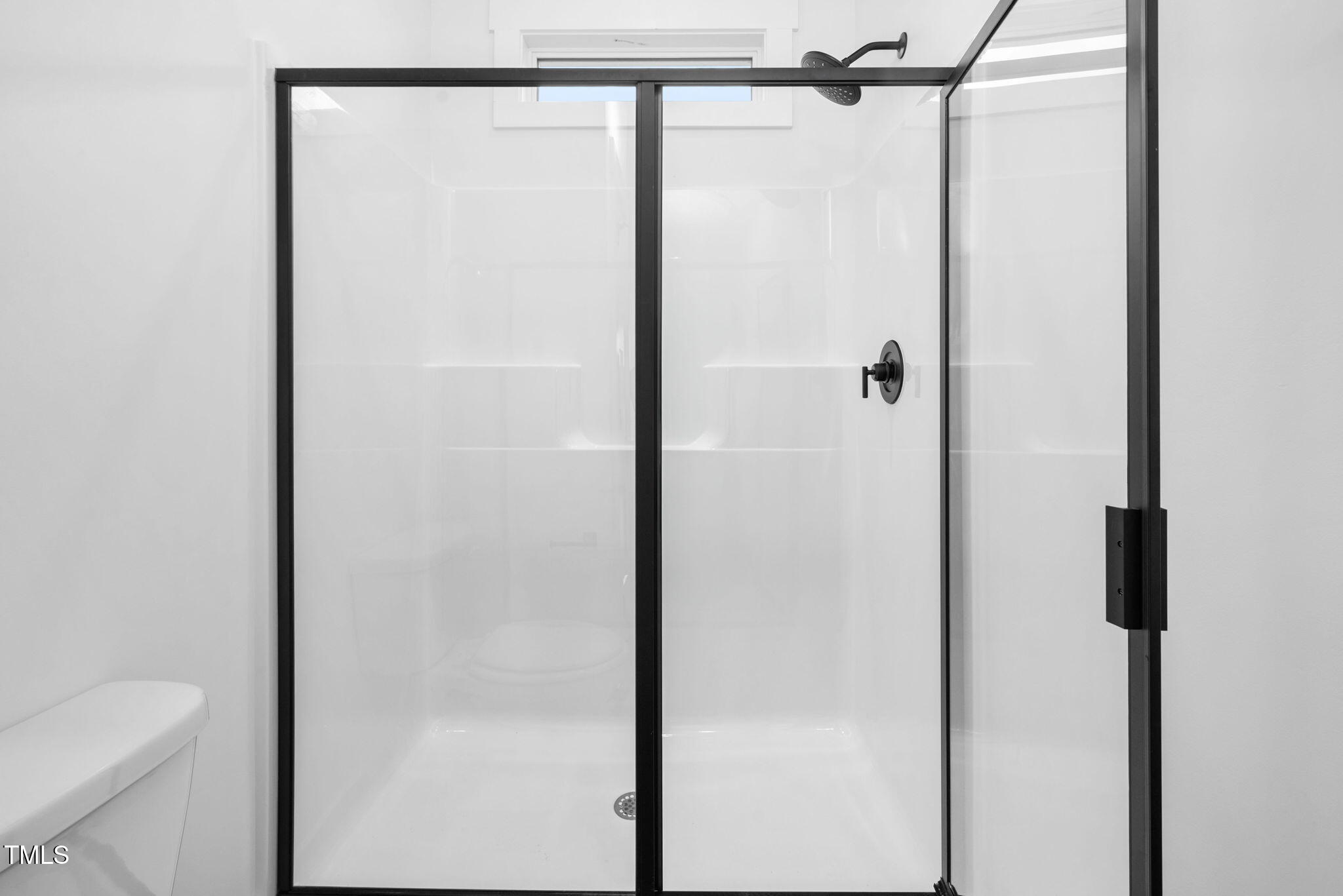 50 Southern Village Drive Roxboro, NC 27573 - Photo 22 of 32 a bathroom with a shower