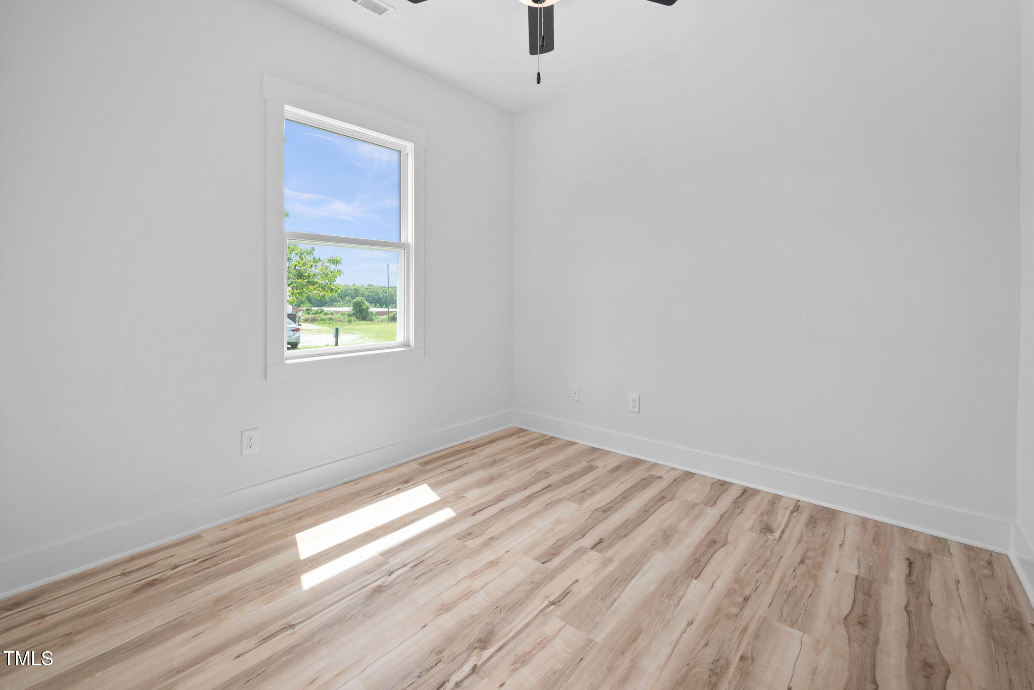 50 Southern Village Drive Roxboro, NC 27573 - Photo 28 of 32 a view of an empty room and window