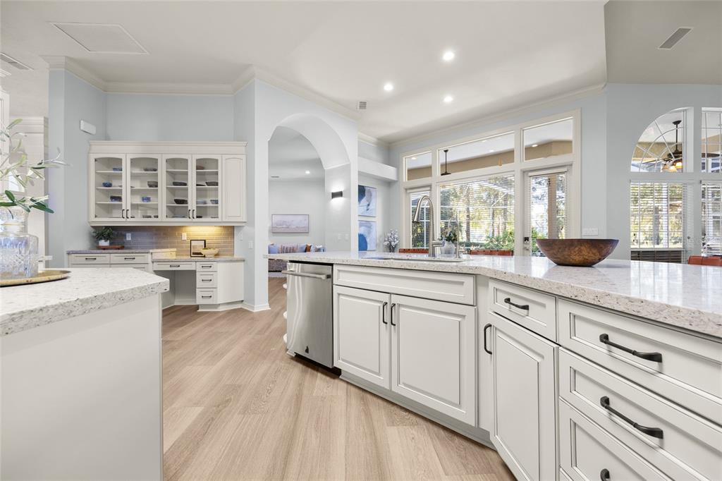 4606 Southwest 97th Terrace Gainesville, FL 32608 - Photo 19 of 68 a large white kitchen with cabinets