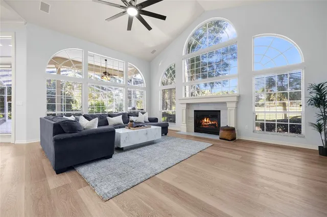 a bed room with a bed and wooden floor