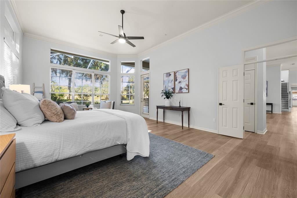 4606 Southwest 97th Terrace Gainesville, FL 32608 - Photo 29 of 68 a bedroom with a bed wooden floor and window