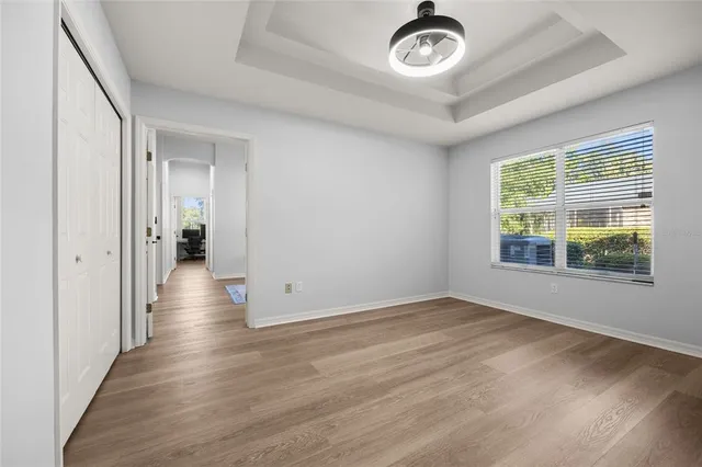 a view of empty room with a large window