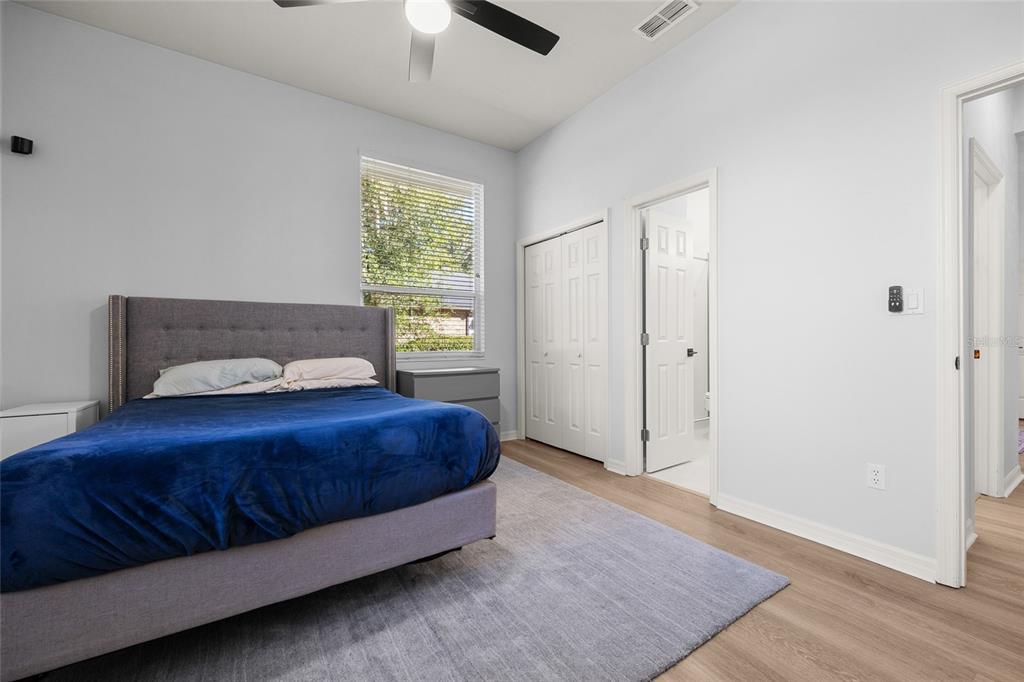 4606 Southwest 97th Terrace Gainesville, FL 32608 - Photo 43 of 68 a bedroom with a bed and window