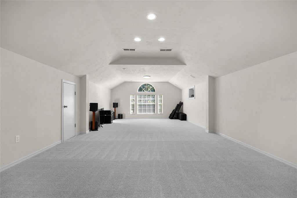 4606 Southwest 97th Terrace Gainesville, FL 32608 - Photo 46 of 68 a view of empty room with a large window