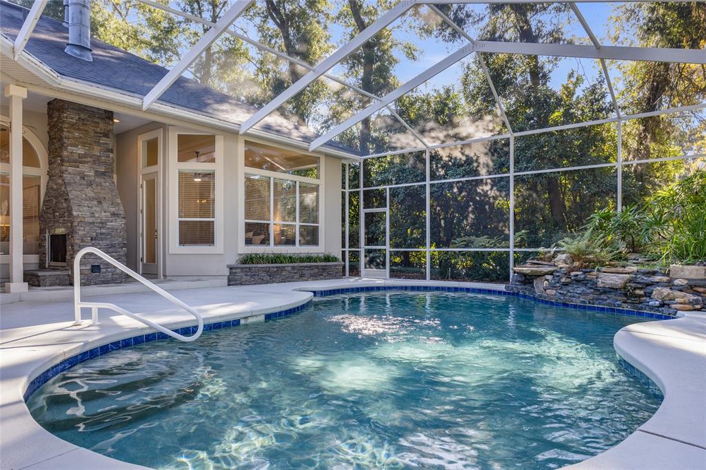 4606 Southwest 97th Terrace Gainesville, FL 32608 - Photo 52 of 68 a view of a swimming pool with a patio